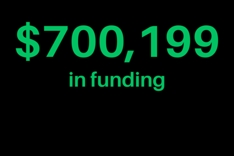 Black background with green text: $700,199 in funding 